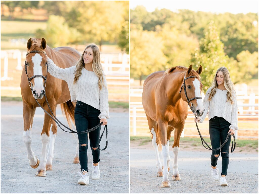 A blonde rider in a white sweater walks her chestnut hunter gelding on a wide gravel driveway. Gravel driveways are easy, scenic locations for equestrian portraits. 